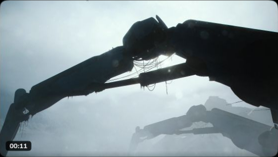 A huge mechanical structure with hanging cables spans the snowy mountains in the official Frozen Trail teaser.